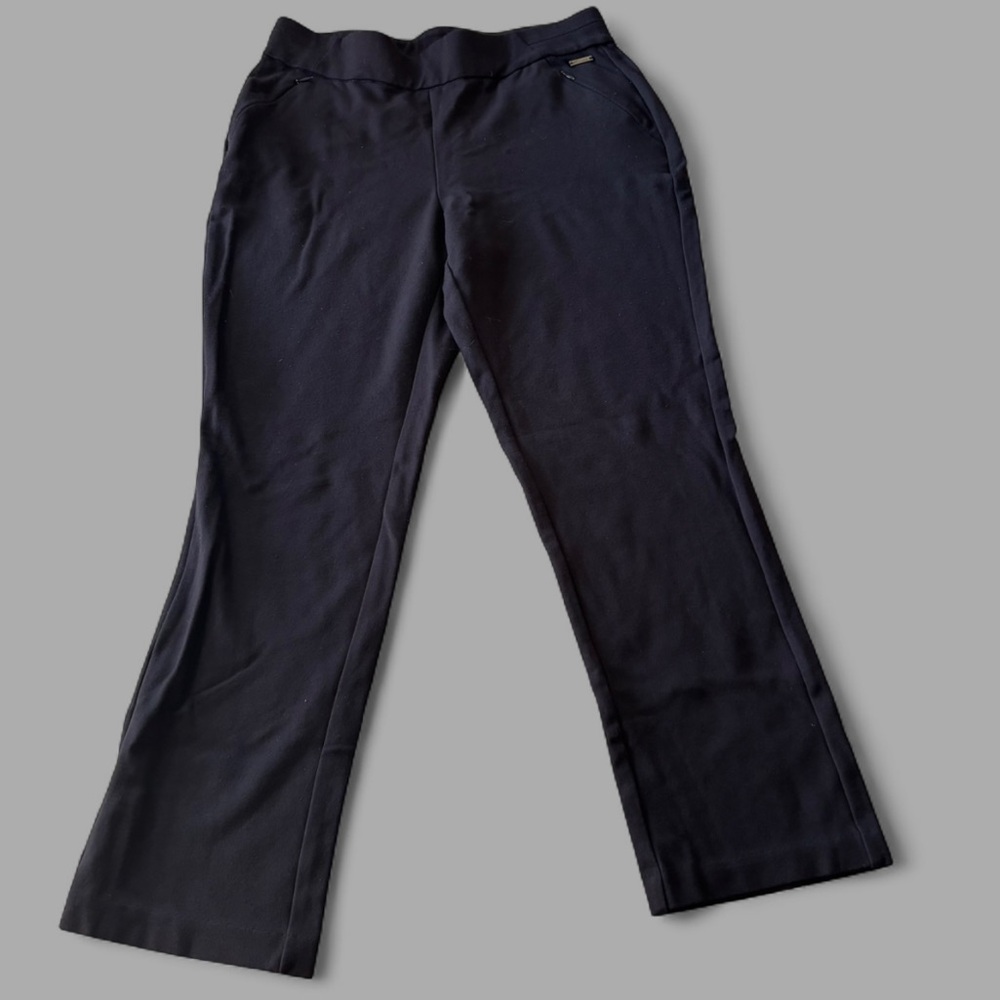 T Tahari trousers with a flared leg and zipper pockets